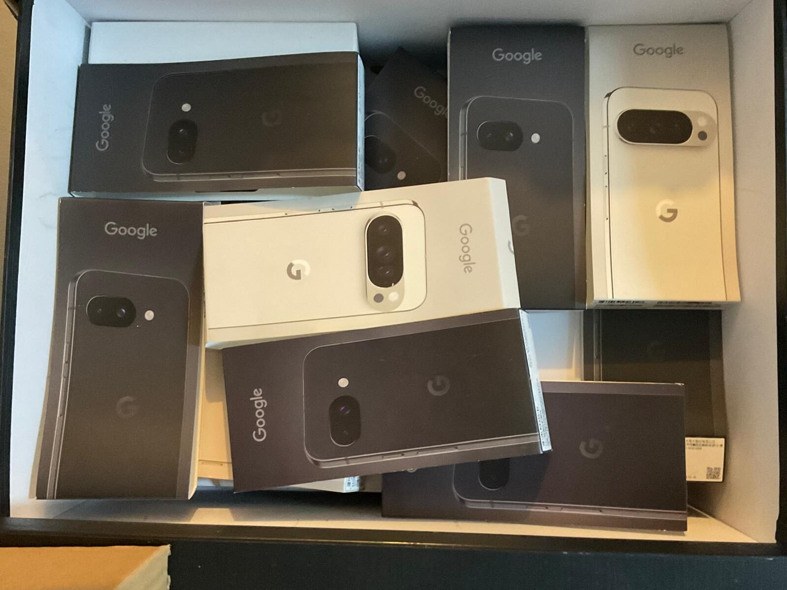 Stack of Pixel retail boxes ready for provisioning