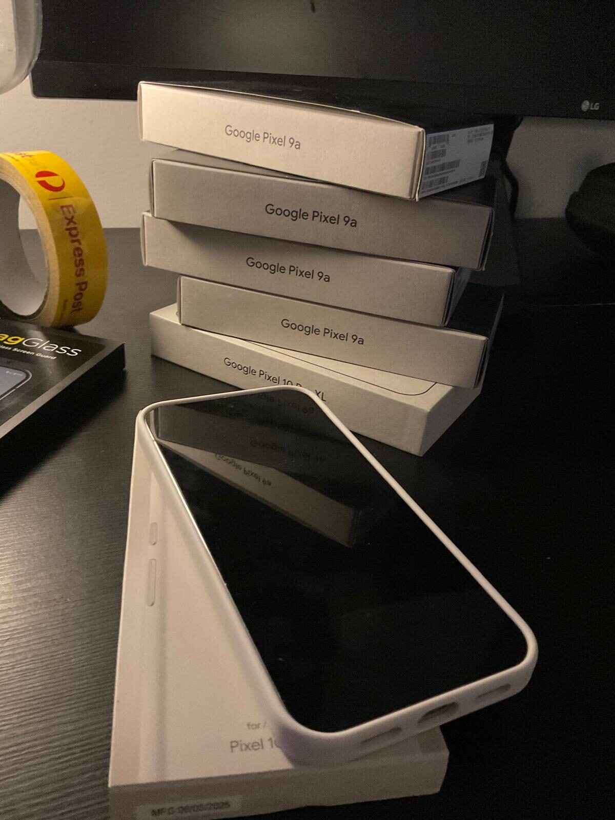 Prepared Pixel resting on a stack of boxes