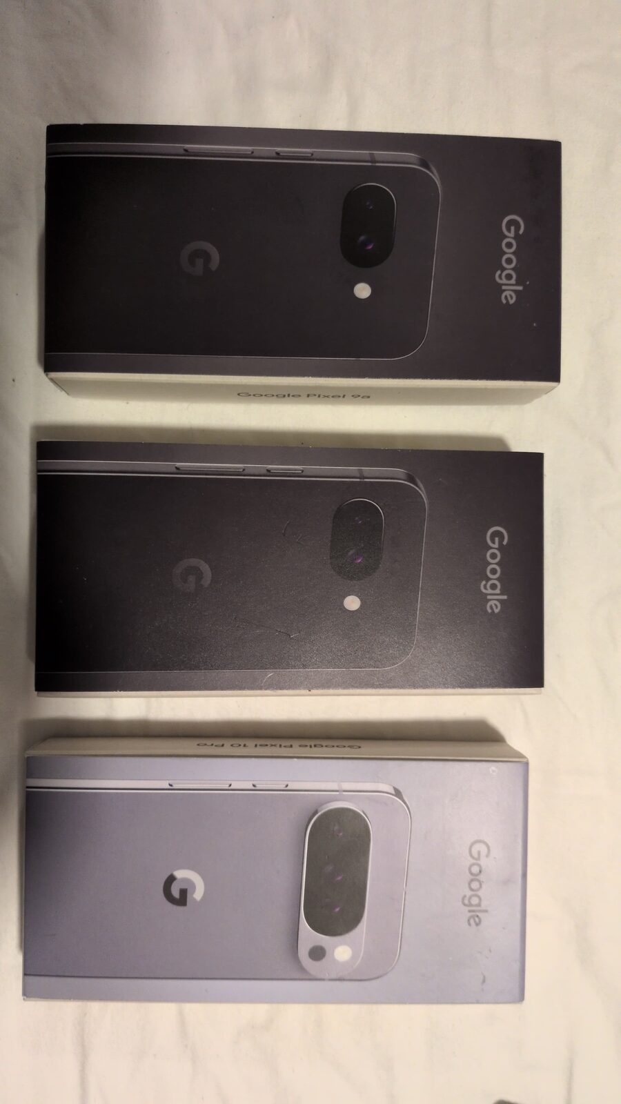 Three Pixel retail boxes in a row